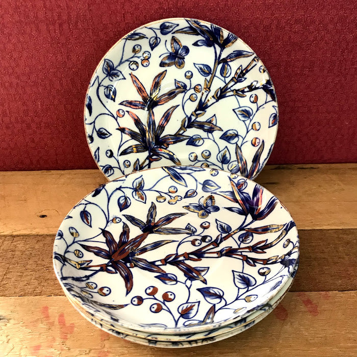 Vintage blue, white and gold saucers x 4